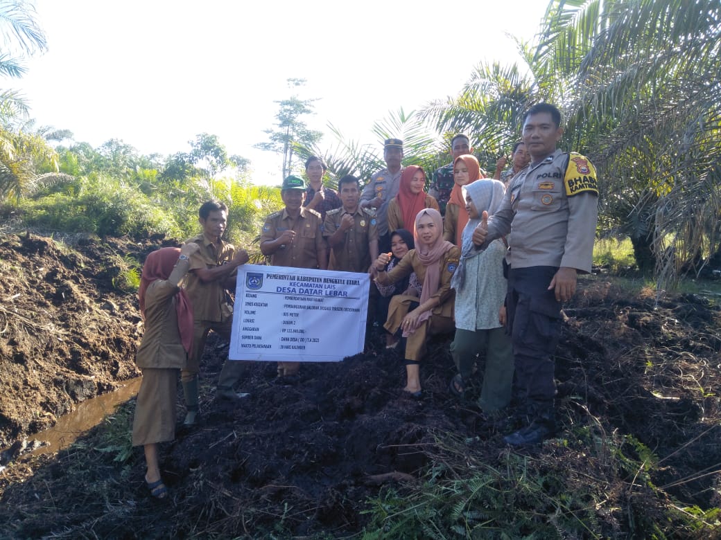 Monitoring Penggunaan DD, Kapolsek Lais Hadiri Kegiatan Penetapan Titik Nol Pembangunan Irigasi